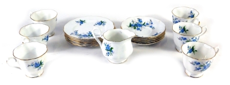 A Royal Albert Forget Me Not pattern part tea service, comprising six cups, four saucers, six side plates, and milk jug, 11cm high, printed marks beneath. (a quantity)