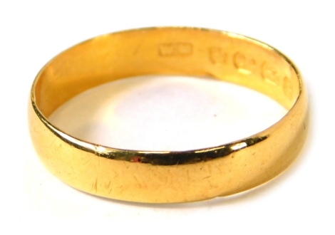 A 22ct gold wedding band, size M, 2.3g.