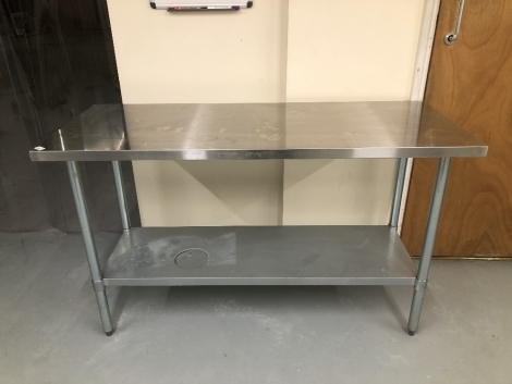 A stainless steel preparation table, 150cm x 60cm. Note: VAT is payable on the hammer price of this lot at 20%.