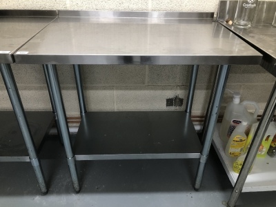 A stainless steel preparation table, 90cm x 60cm, with rear lip. Note: VAT is payable on the hammer price of this lot at 20%.