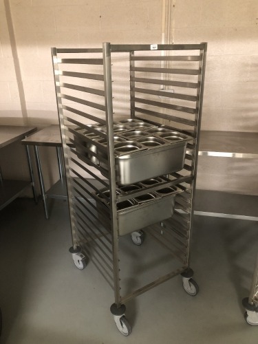 A Gastronorm stainless steel tray trolley, with three bains marie trays, each with six drop in GN bins. (Cost over £500+vat in 2022) Note: VAT is payable on the hammer price of this lot at 20%.