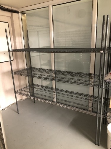 A plastic coated wire mesh shelving rack, with three shelves, 183cm high, 180cm wide, 60cm deep. Note: VAT is payable on the hammer price of this lot at 20%.