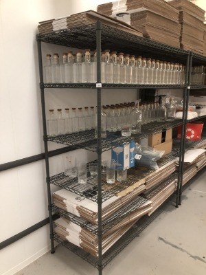 A plastic coated wire mesh shelving rack, with six shelves, 183cm high, 150cm wide, 60cm deep. Note: VAT is payable on the hammer price of this lot at 20%.