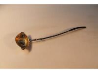 A 19thC white metal toddy ladle with an oval fluted gilded bowl