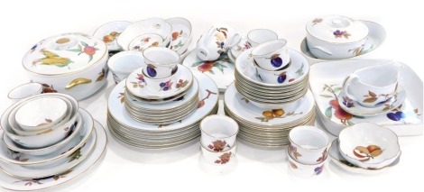 A Royal Worcester Evesham part service, to include oval serving dish decorated with sweetcorn, 18cm wide, large lidded souffle dish, floral shaped bowl, various dinner plates, bowls, serving plates, smaller souffle dish, ramekins, gravy boat on stand, etc