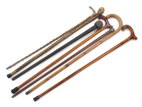 Various walking sticks, a dandy cane with turned plated knop, 88cm long, various other walking sticks, etc. (a quantity)