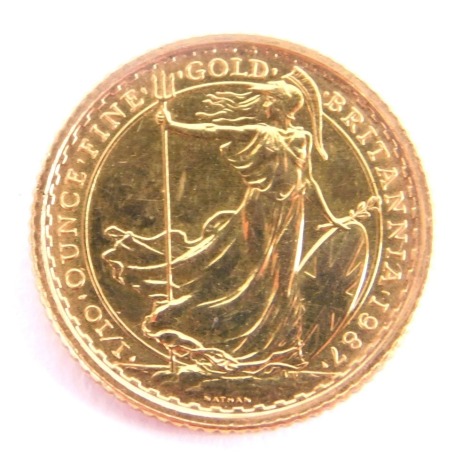 An Elizabeth II 1/10oz gold ten pound coin, 1987, 3.4g.