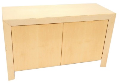 A Danish Skovby maple side cabinet, model number SM82MB, with two doors on plain and end supports, 73cm high, 124cm wide, 48cm deep.