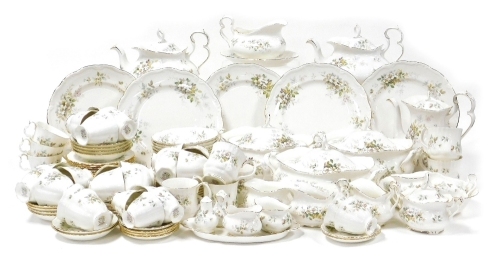 A Royal Albert Haworth pattern porcelain coffee, tea, and dinner service, to include three two handled lidded tureens, teapot, coffee pot, coffee cups and saucers, teacups and saucers, two handled sugar bowl, side plated, dinner plates, breakfast bowls, e