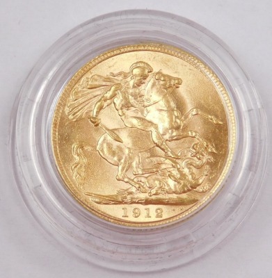 A George V full gold sovereign, dated 1912, 8g, in fitted box with outer packaging. - 2