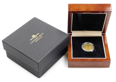 A George III gold full sovereign, dated 1820, 7.7g, in fitted box with outer packaging.