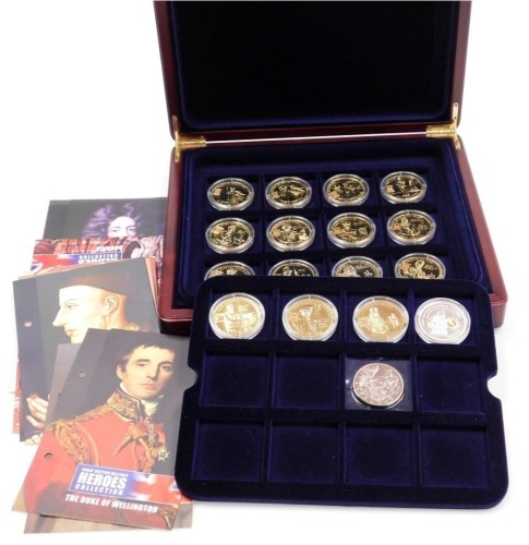 Fifteen Great British Military Heroes Collection gold plated proof coins, together with two silver proof crowns commemorating the 200th Anniversary of The Battle of Trafalgar, cased.