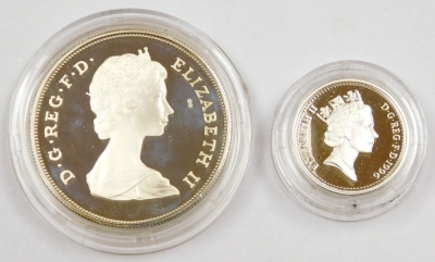 An Elizabeth II silver proof one pound coin, with case, and a commemorative crown 1980, cased. (2) - 3