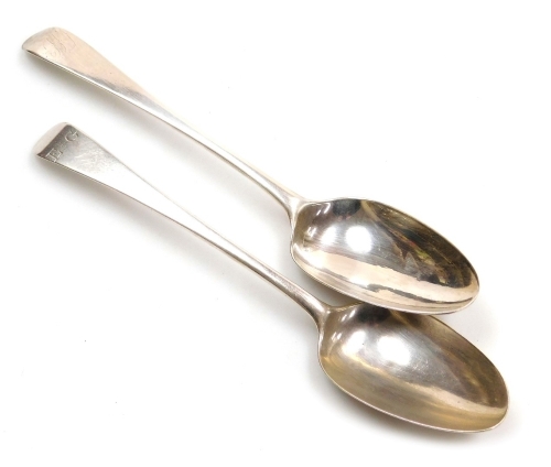 Two Georgian silver Old English pattern serving spoons, initial engraved, hallmarks rubbed, unmatched, 3.75oz.