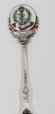 A group of small silver and white metal items, comprising a Continental white metal handled carving knife and fork, embossed with scrolls and flowers, marked 800, four commemorative enamel silver teaspoons, for Canada, Limerick, Pontresina and The Royal A - 2