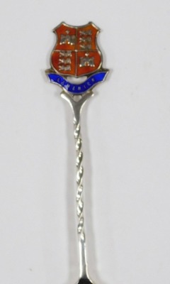 A group of small silver and white metal items, comprising a Continental white metal handled carving knife and fork, embossed with scrolls and flowers, marked 800, four commemorative enamel silver teaspoons, for Canada, Limerick, Pontresina and The Royal A - 3