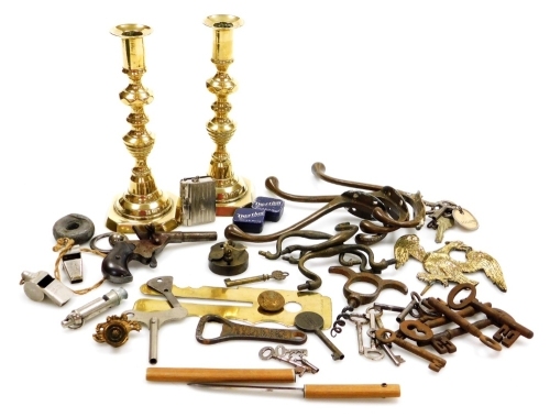 A group of collectables, to include iron keys, an Acme Guide whistle, furniture handles, brass lock, brass candlesticks, further keys, etc. (1 tray) NB. Imaged pistol not included.