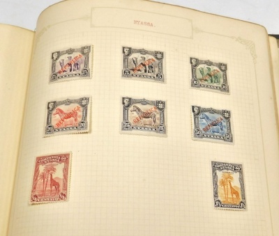 Philately. A stamp album, definitive, commemorative, world, GB and commonwealth used and unused stamps to include a Victorian penny black with watermark, George V Silver Jubilee penny, Canada, China, Japan, Liechtenstein, Ukraine, Nyassaland, Persia, Bava - 20