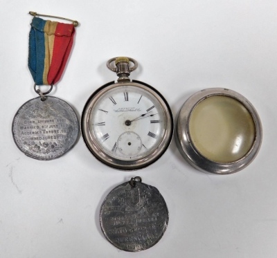 A Waltham gentleman's pocket watch, open faced, keyless wind, circular dial bearing Roman numerals, subsidiary seconds dial, the white metal case of plain form, with outer case, together with three silver medallions, two engraved St Thomas N. School, 1901 - 2