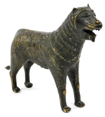 An Indo Persian bronze figure of a lion, probably 19thC, 17cm high.