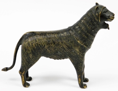 An Indo Persian bronze figure of a lion, probably 19thC, 17cm high. - 2