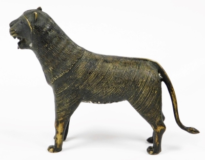 An Indo Persian bronze figure of a lion, probably 19thC, 17cm high. - 4