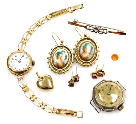 A 9ct gold cased lady's wristwatch, on plated bracelet strap, silver cased lady's wristwatch, pair of late 19thC Continental gilt metal and porcelain drop earrings, 9ct gold heart shaped locket, two pairs of gem set earrings, and an Edwardian 9ct gold see