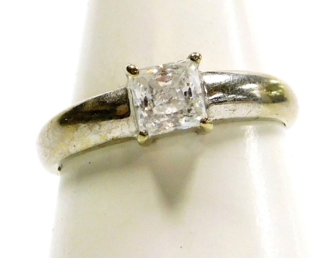 A 9ct white gold and cubic zirconia solitaire ring, square cut, size P, 3.0g.