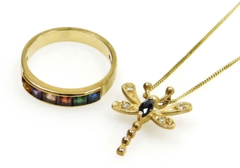 A 9ct gold and multi gem set ring, channel set, size N, together with a 9ct gold sapphire and diamond dragonfly pendant on chain, 4.8g.