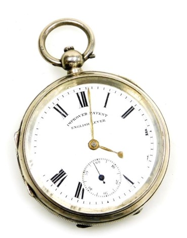 An Edward VII silver pocket watch, open faced, key wind, circular enamel dial bearing Roman numerals, subsidiary seconds dial, single barrel movement, number 500987, the case with engine turned decoration, vacant shield and garter reserve, Chester 1901.