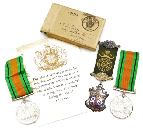 Two World War II Defence medals, together with a Royal Andalucian Order of the Buffaloes silver and enamel jewel, presented to Primoe Pettitt, by the 251 Marsland Lodge February 1920.