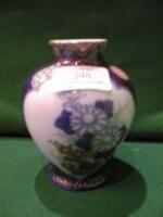 A Fukagawa baluster vase painted with opposing panels of flora 4 1/2" high