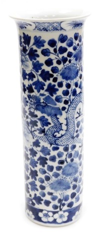 A Qing dynasty blue and white porcelain sleeve vase, hand painted with dragons and flowering shrub decoration within a banded border, under glaze blue four character Kangxi mark, 36.5cm high.