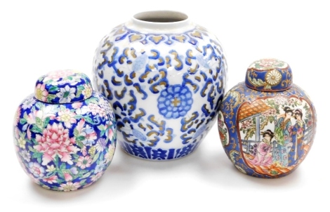 A Chinese blue and white ginger jar, with gilt highlights, lacking cover, 20cm high, together with two modern Chinese ginger jars and covers, having polychrome enamel decoration, 16cm high and 15cm respectively.