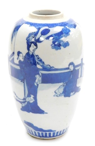 A Chinese blue and white ovoid vase, hand painted with figures on a terrace, 23cm high, lacking cover, drilled for lamp wire.