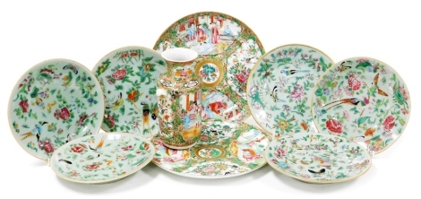 A group of late 19thC Qing dynasty famille rose porcelain, comprising six celadon plates, enamel decorated with birds, butterflies and flowers, 19cm wide, pair of famille rose porcelain plates decorated with reserves of figures in interiors, birds, butter