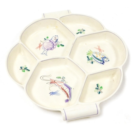 A Poole pottery six division hors d'oeuvres dish, painted with fish and leaves, printed and painted marks, 34cm wide.