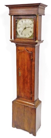 A Georgian oak longcase clock by Wood of Grantham, square dial with painted spandrels, chapter ring bearing Roman numerals, two train, eight day movement with bell strike, the hood with turned columns, brass capped, the trunk of plain form, raised on brac