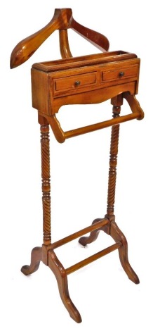 A 20thC mahogany valet stand, the top with two drawers and rail, raised on turned tapering supports and cabriole legs, 120cm high.