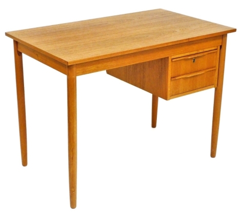 An Ejsing Mobelfabrik Danish teak desk, the rectangular top above two side drawers, raised on circular tapering legs, 74cm high, 100cm wide, 59cm deep.