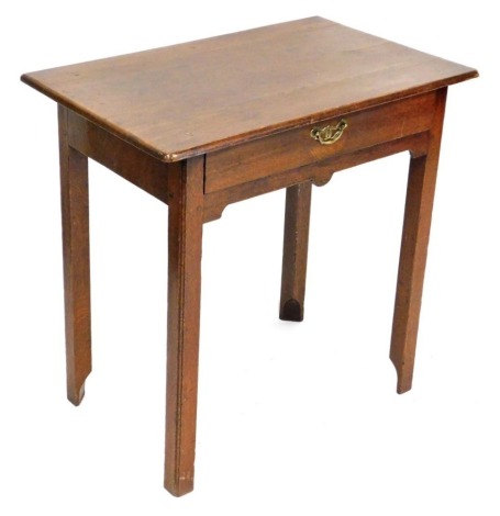 A late 18th/early 19thC oak side table, with a planked top, frieze drawer and shaped apron, the legs of plain form with re-entrant feet, 73cm wide.