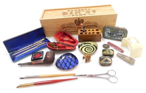 A group of collectables, to include a Fonseca port bottle box, three ball point pens, various tins, two Artisware enamelled copper trinket dishes, etc. (1 tray)