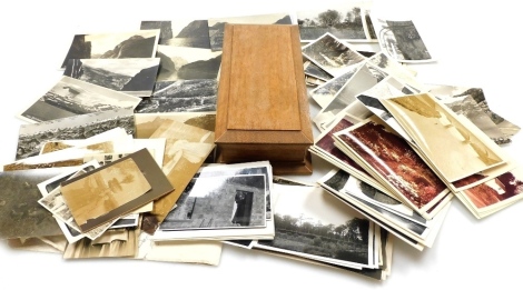 A group of early 20thC and later photographs and postcards, depicting figures, some in military dress, views of Engelberger, Snehetta, Fjaernand, Barholm, further scenes of Norwegian Fjords, etc. (a quantity), together with a treen box, of rectangular for