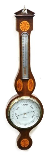 An early 20thC mahogany and inlaid Sheraton revival banjo barometer, the case inlaid with shells, rosettes, etc., a silvered dial bearing the name R. Barker & Son London, 99cm high.