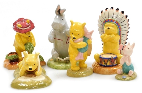 Six Royal Doulton Classic Pooh figures, comprising Summer Is Full Of Fluttery Surprises, WP38, Love Makes All Your Bothers Disappear, WP39, Big Chief Pooh, WP88, I Love You So Much Bear, WP46, Preparations For Carrot Honey Pie, WP69, and Eeyore On Percuss