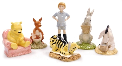 Six Royal Doulton figures from the Winnie The Pooh Collection, comprising Rabbit Reads The Plan, WP23, Winnie The Pooh In The Armchair, WP4, Kanga and Roo, WP8, Eeyore's Birthday, WP14, Christopher Robin, WP9, and Tigger Signs The Rissolution, WP6, boxed.