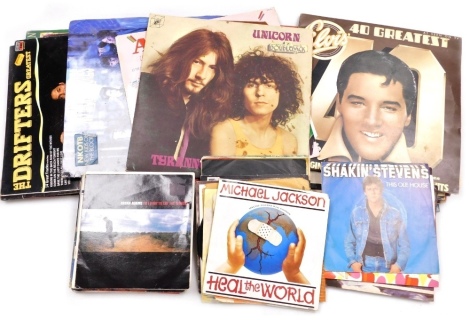 A group of LP records, to include Elvis Presley Romantic Elvis, Rod Stewart, Elvis 40 Greatest Hits, 45rpm singles, Bryan Adams, Shakin' Stevens, Michael Jackson, etc. (a quantity)