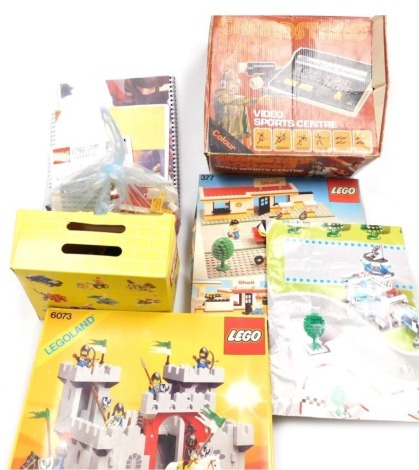 A group of Lego, some sets, to include Shell garage, fort, loose building blocks, together with a Grandstand 360MK3 video sports centre, boxed. (a quantity)