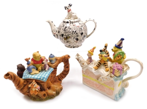 Three Disney pottery teapots, comprising Disney Showcase Collection Winnie The Pooh birthday cake, limited edition number 97/250, Winnie The Pooh, limited edition 875/5000 (AF), together with 101 Dalmatians. (3)