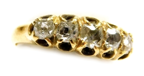 An Edwardian 18ct gold and diamond five stone ring, set with rose cut diamonds in a claw setting, size I, 2.9g.